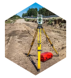 Total station instrument on a tripod at a site